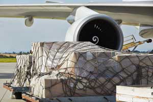 Air freight being loaded on cargo plane
